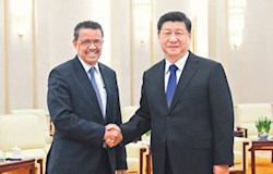 习近平会见世界卫生组织总干事谭德塞