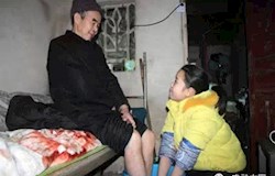 “背”父上学女孩陈春林入围“2014感动中国人物”候选人